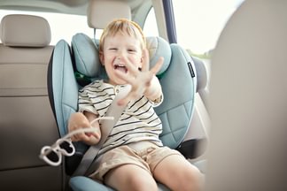 When can a baby face forward in a car seat?